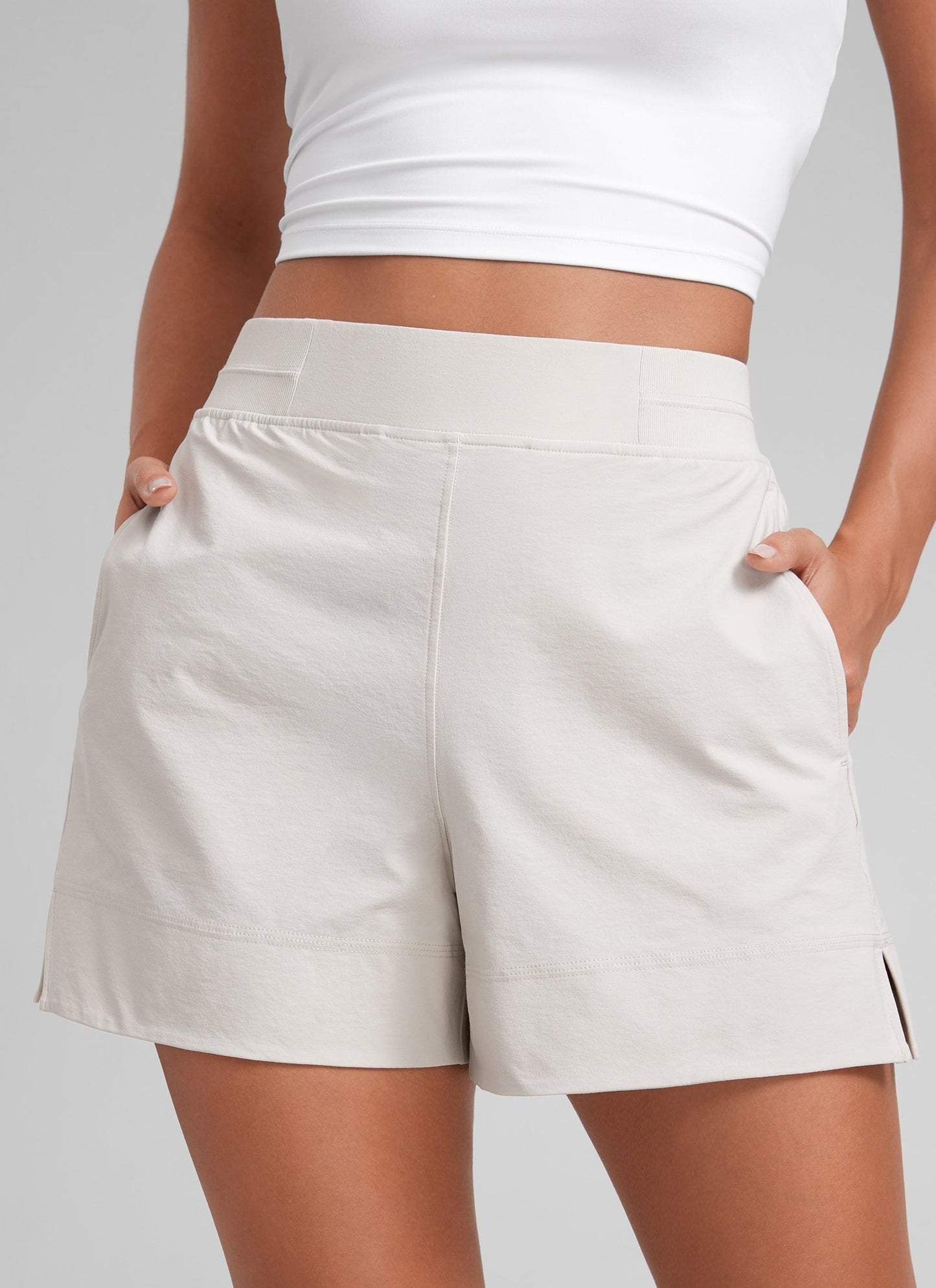 Linerless High Rise V Slit Pocket Shorts 4"