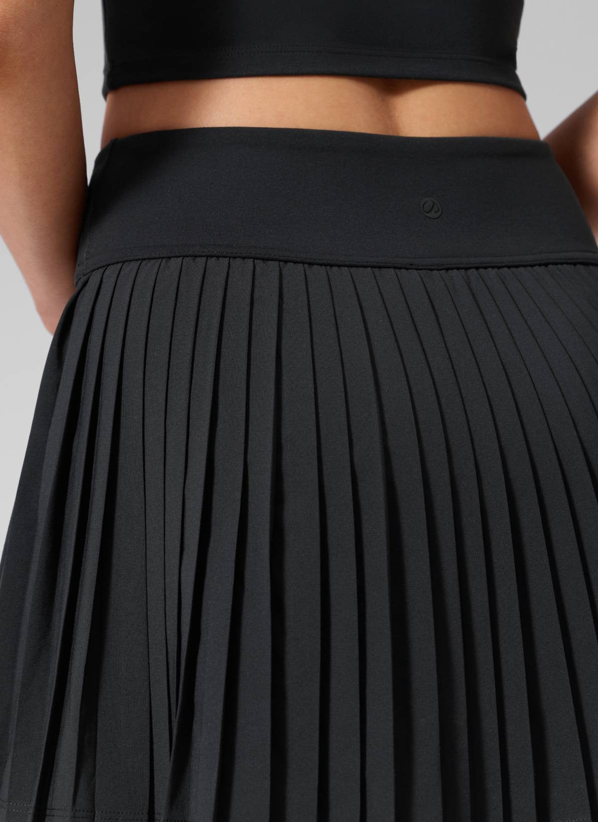 Dual-fabric Pleated Back Mini Tennis Skirt